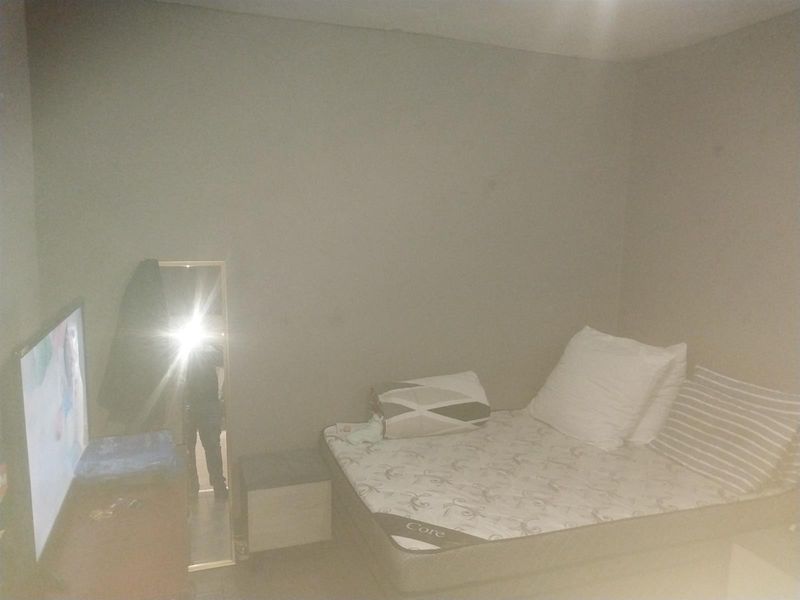 A standard bedroom space with neutral wall finishes, suitable for a variety of bedroom configurations.