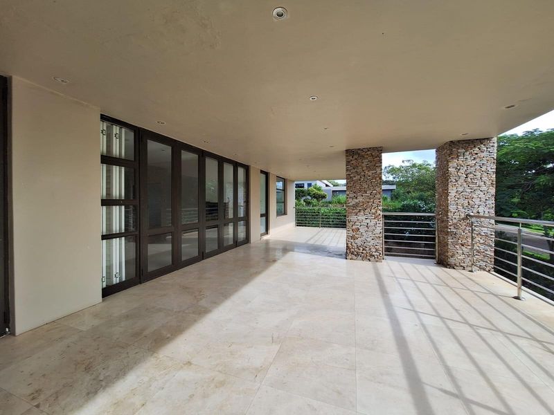 Exceptional Family Living in Brettenwood Coastal Estate - Photo 3