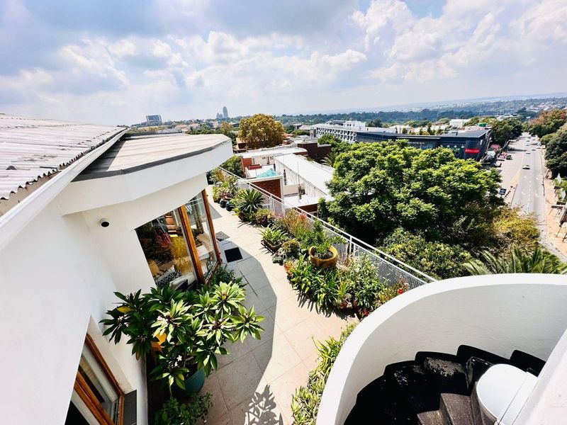 Skyline Sophistication in the Heart of Illovo - Iconic Penthouse Living - Photo 2