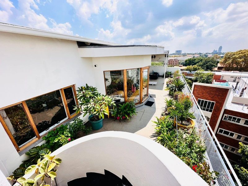 Skyline Sophistication in the Heart of Illovo - Iconic Penthouse Living - Photo 3