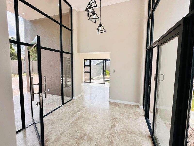 Elegant Family Living in a Secure Bryanston Enclave, with Separate Cottage! - Photo 6