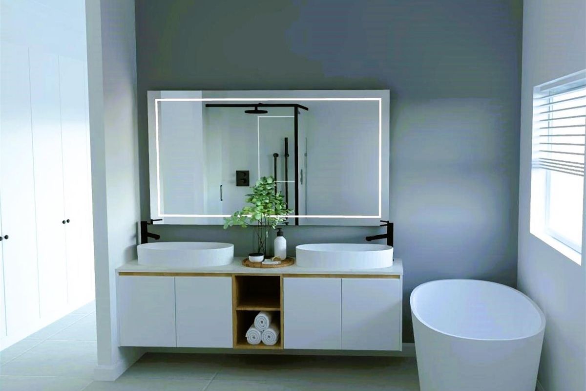 Modern bathroom featuring a floating double vanity with vessel sinks, matte black fixtures, and a large illuminated mirror.