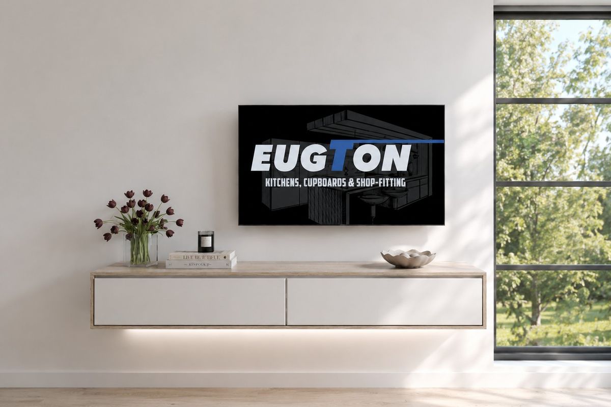A modern living room featuring a sleek floating cabinet with integrated under-cabinet lighting and a large window providing natural light.