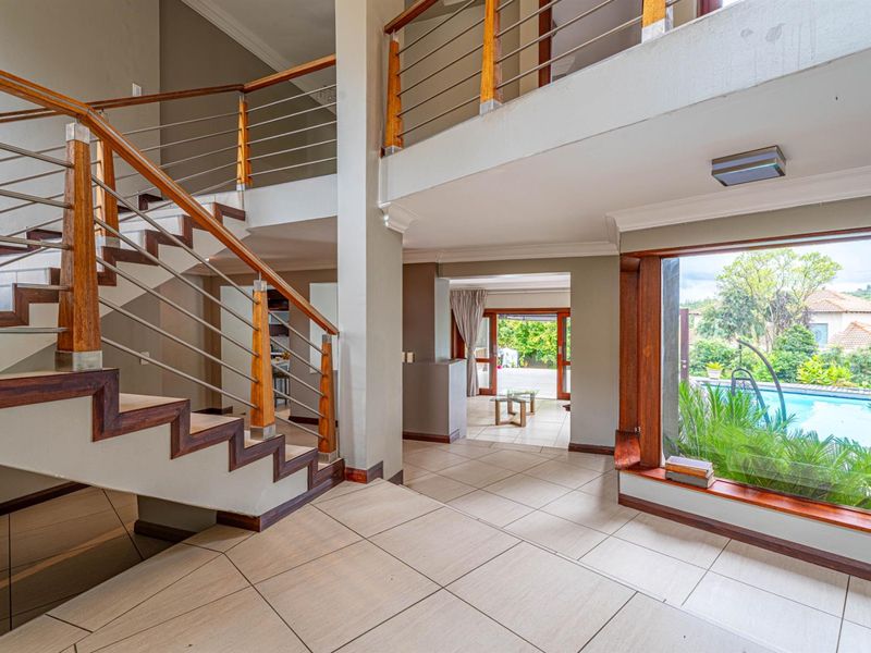 A MASTERPIECE OF BALINESE ELEGANCE | SUNSET VIEWS • TRANQUIL LUXURY • RESORT-STYLE LIVING - Photo 4