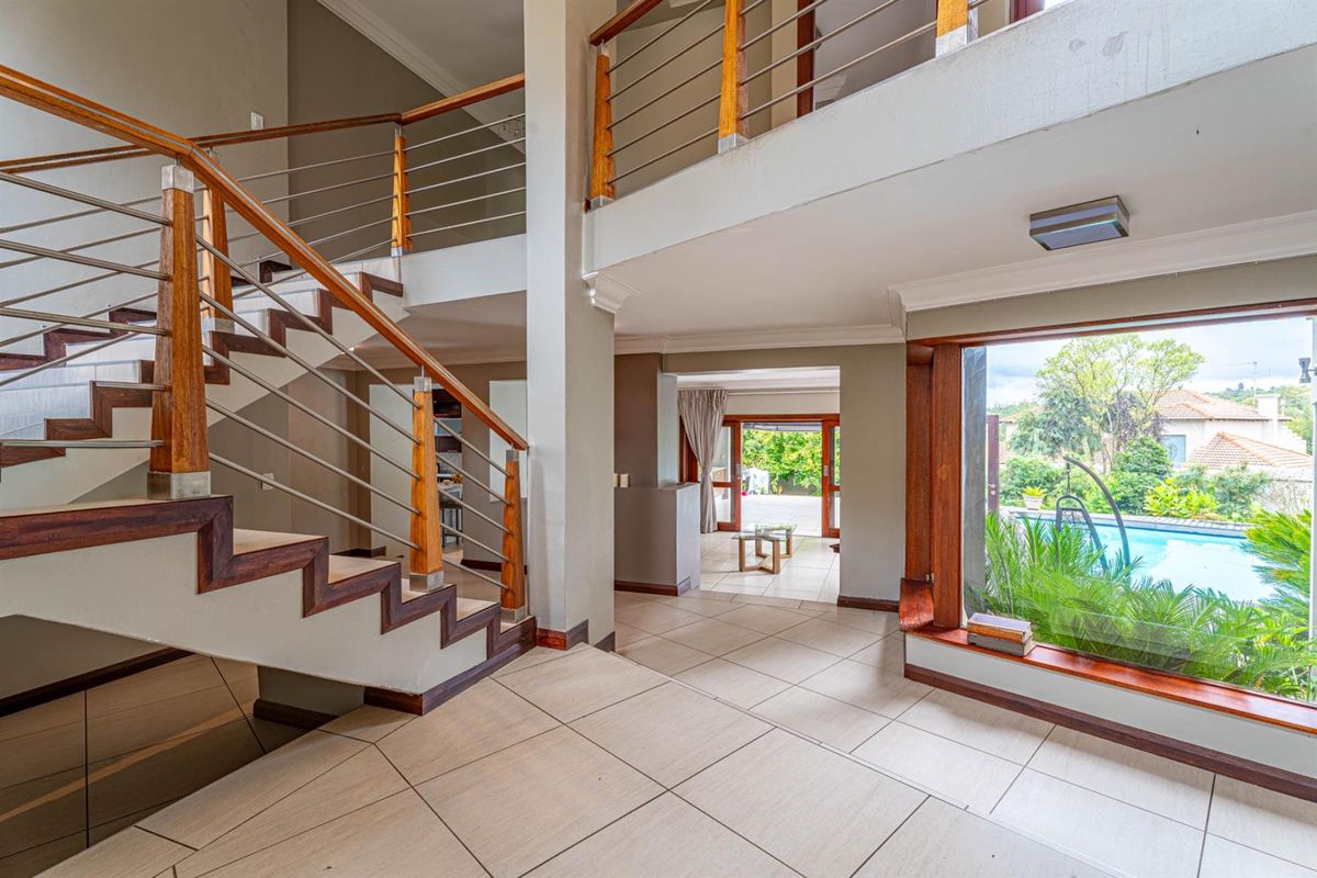 A MASTERPIECE OF BALINESE ELEGANCE | SUNSET VIEWS • TRANQUIL LUXURY • RESORT-STYLE LIVING - Photo 4