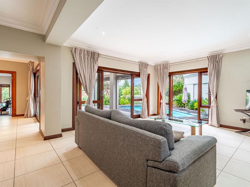 A MASTERPIECE OF BALINESE ELEGANCE | SUNSET VIEWS • TRANQUIL LUXURY • RESORT-STYLE LIVING - Photo 6