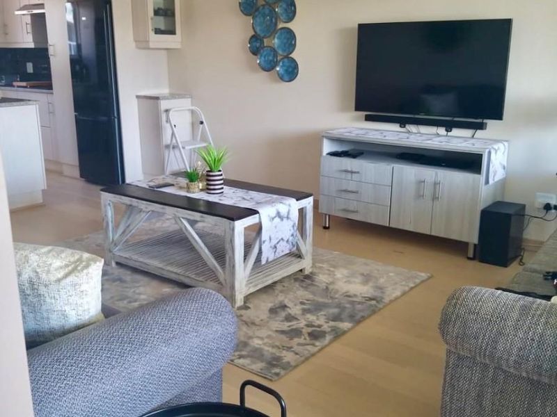 Front-Row Ocean View Apartment with Garage and Backup Power in De Bakke - Photo 9