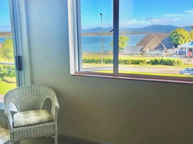 Front-Row Ocean View Apartment with Garage and Backup Power in De Bakke - Photo 7