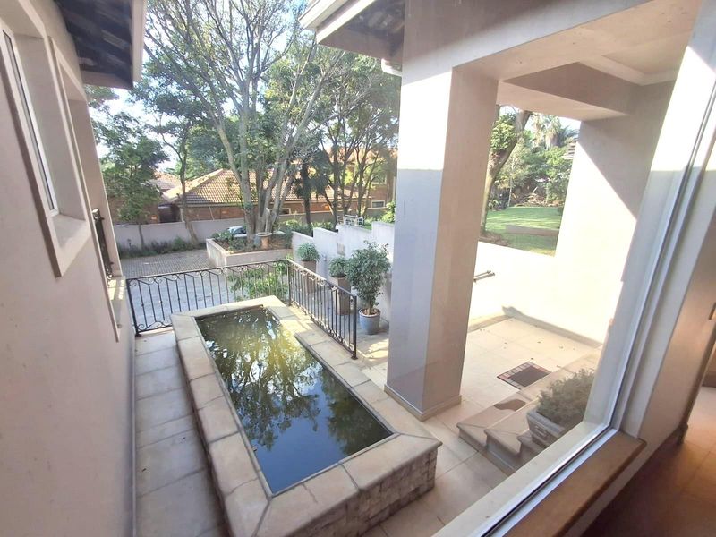 A FAMILY OASIS NESTLED IN PRISTINE BEDFORDVIEW - Photo 5