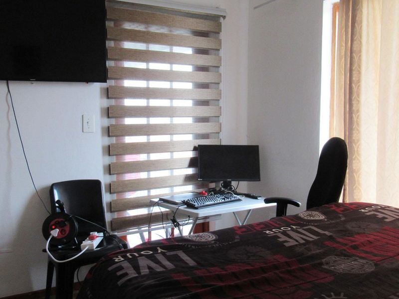 Top Floor 2 Bedroom Townhouse with Balcony Views, Pool and Covered Parking - Photo 9