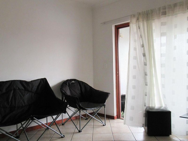 Top Floor 2 Bedroom Townhouse with Balcony Views, Pool and Covered Parking - Photo 5