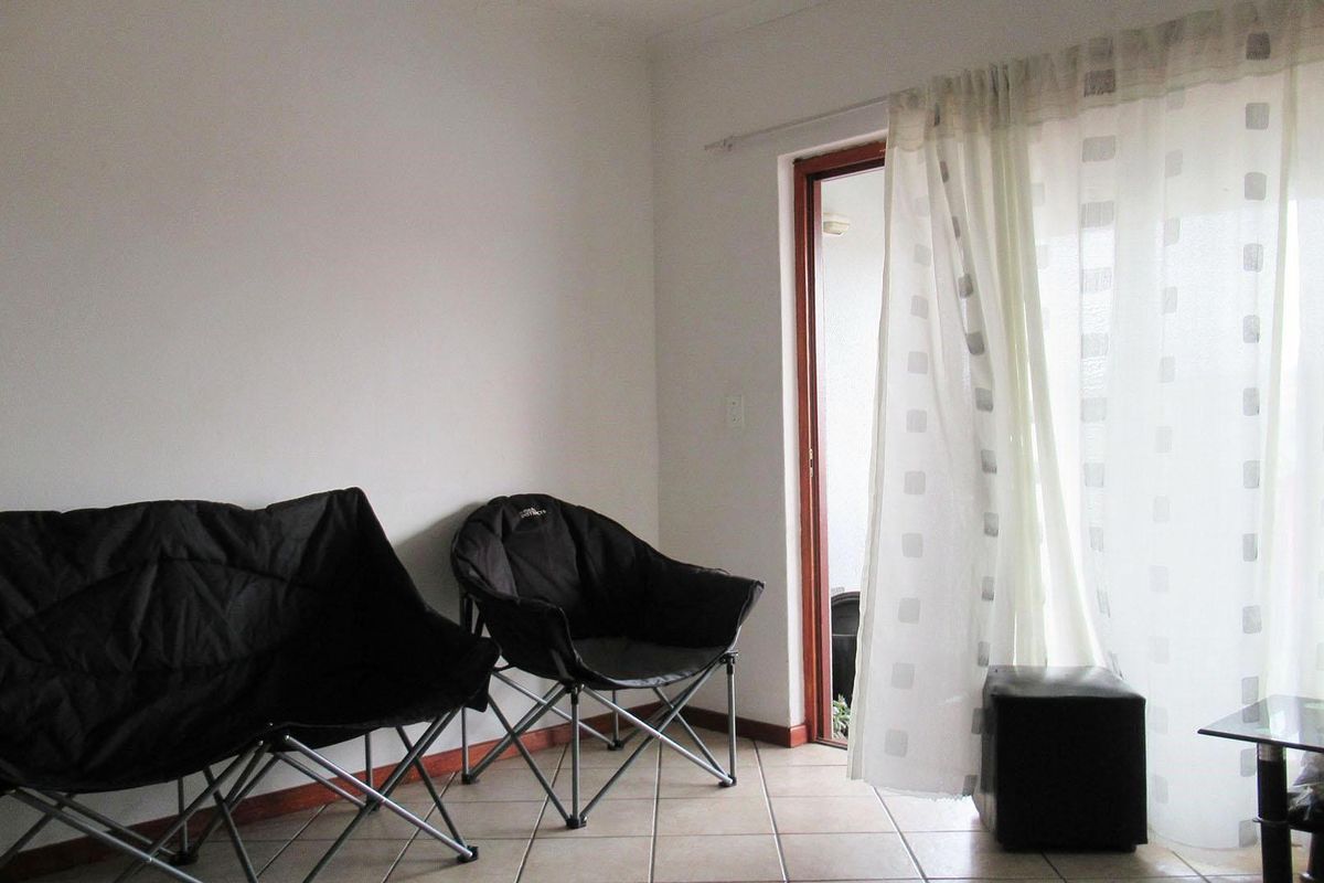 Top Floor 2 Bedroom Townhouse with Balcony Views, Pool and Covered Parking - Photo 5