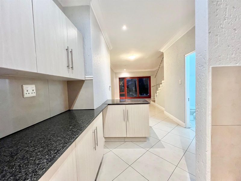 2-Bedroom Top Floor Apartment with Low Levies In Morningside's Best Location - Photo 6