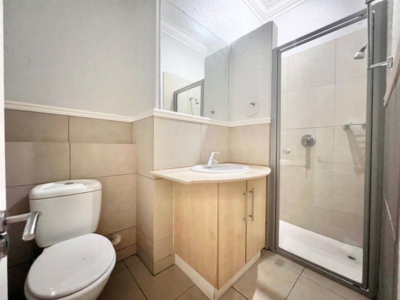 2-Bedroom Top Floor Apartment with Low Levies In Morningside's Best Location - Photo 10