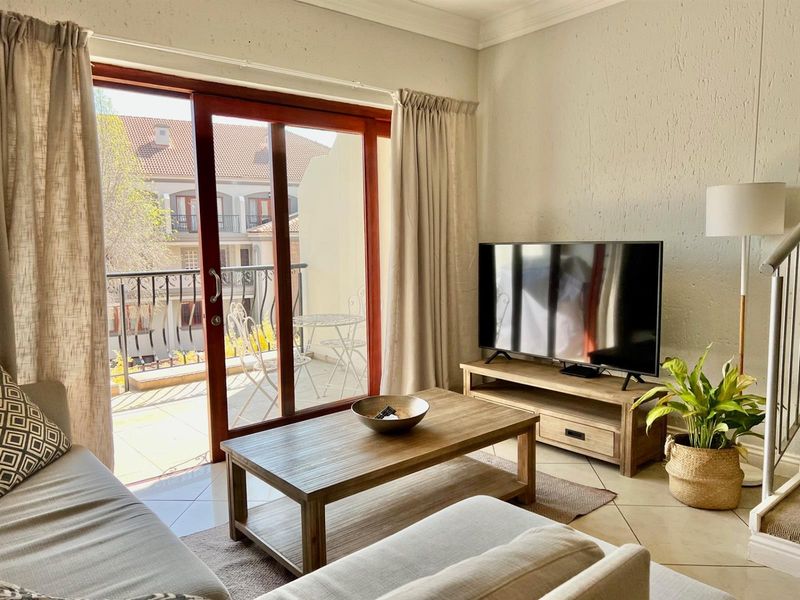 2-Bedroom Top Floor Apartment with Low Levies In Morningside's Best Location - Photo 2