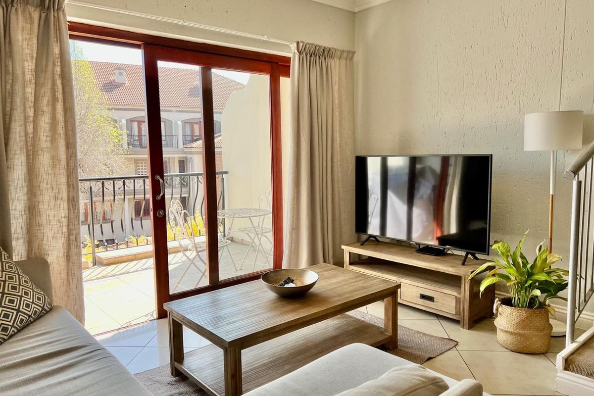 2-Bedroom Top Floor Apartment with Low Levies In Morningside's Best Location - Photo 2