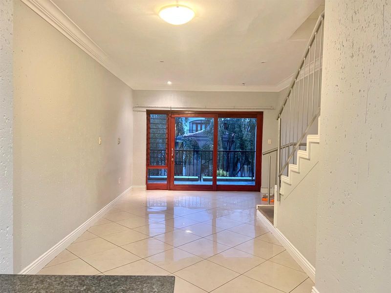 2-Bedroom Top Floor Apartment with Low Levies In Morningside's Best Location - Photo 3