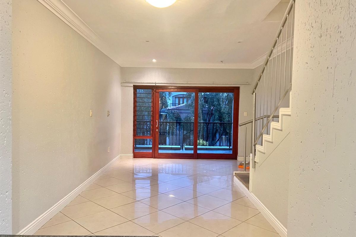 2-Bedroom Top Floor Apartment with Low Levies In Morningside's Best Location - Photo 3