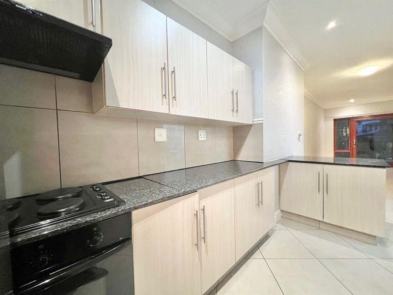 2-Bedroom Top Floor Apartment with Low Levies In Morningside's Best Location - Photo 5