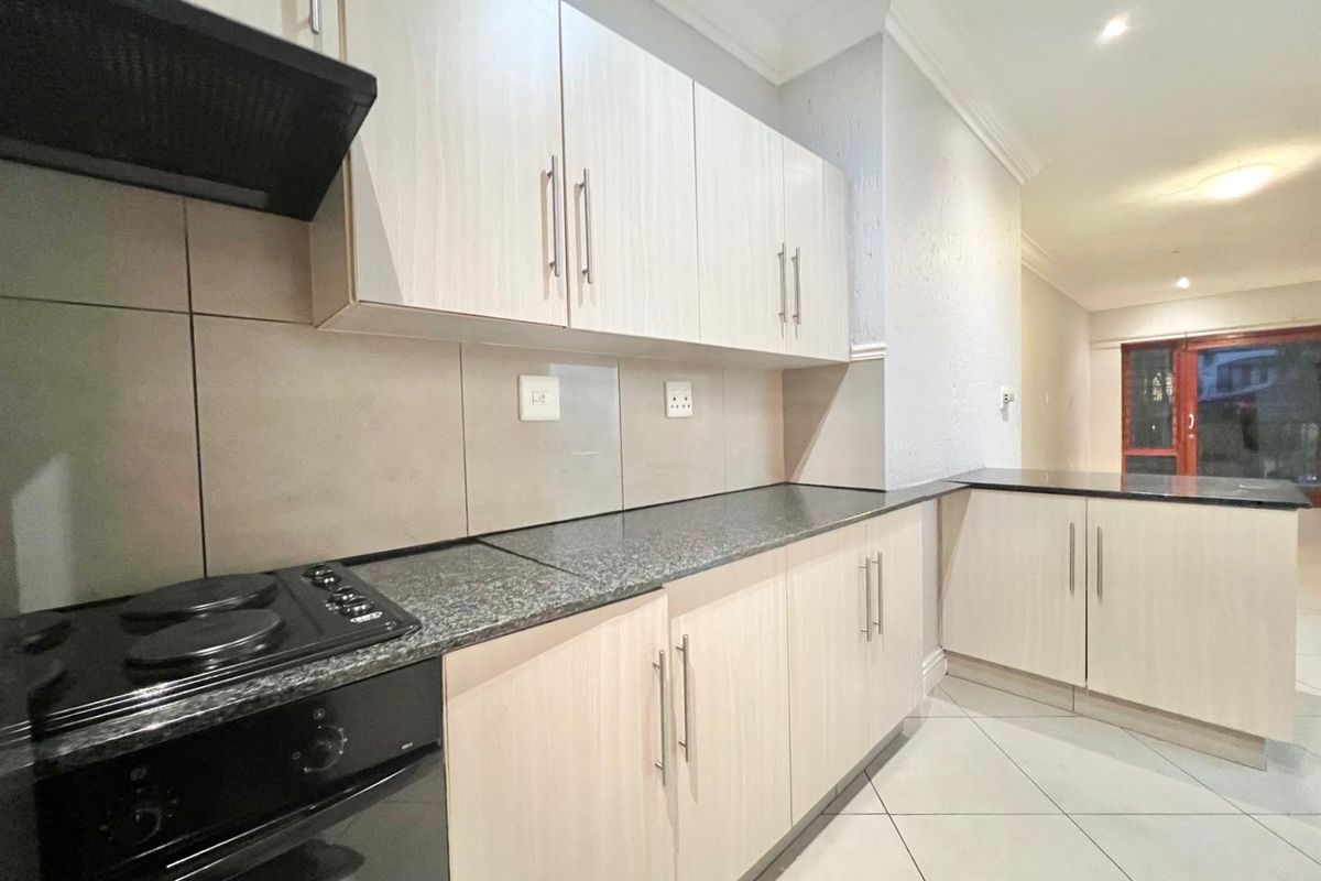 2-Bedroom Top Floor Apartment with Low Levies In Morningside's Best Location - Photo 5