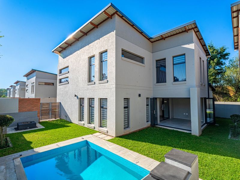 MODERN FAMILY LIVING WITH ENTERTAINMENT APPEAL | THE WRENS, CARLSWALD - Photo 1