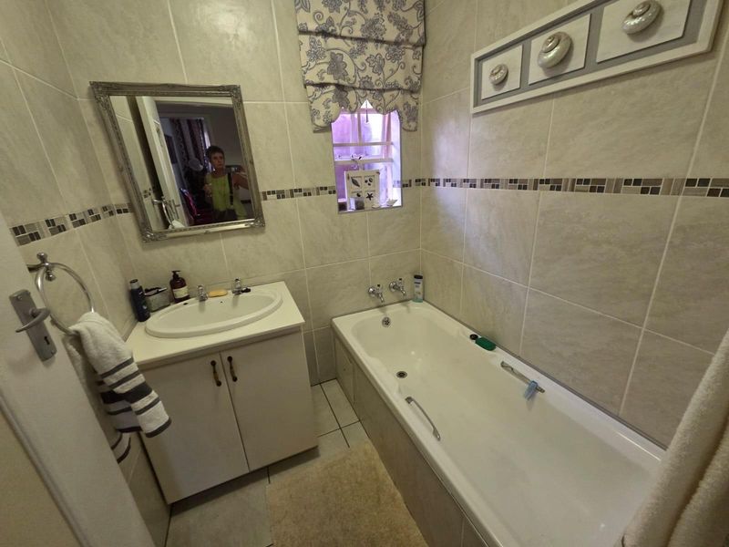 Spacious 4-Bedroom Home with Inverter and Backup Battery - Photo 10