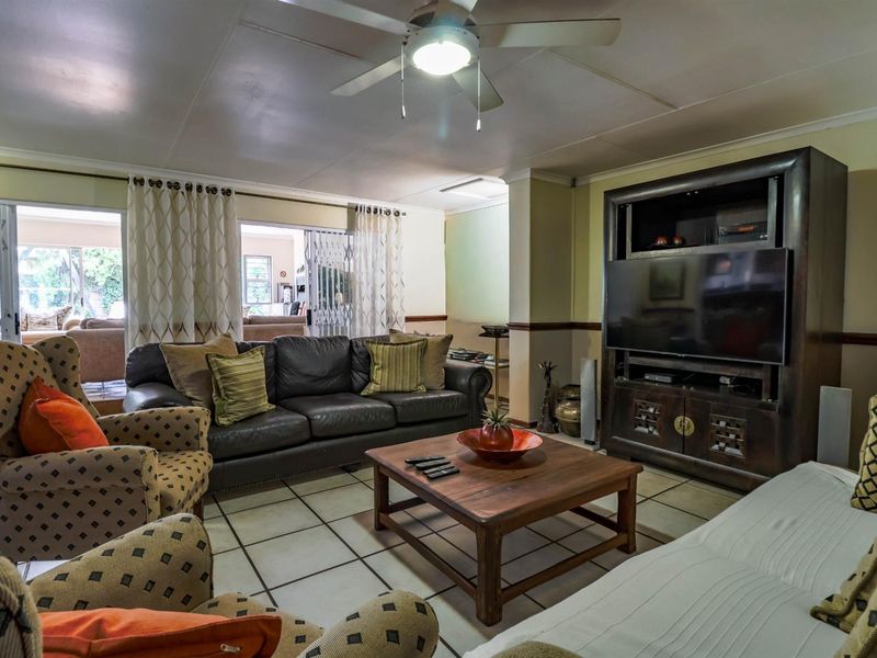 Spacious 4-Bedroom Home with Inverter and Backup Battery - Photo 4