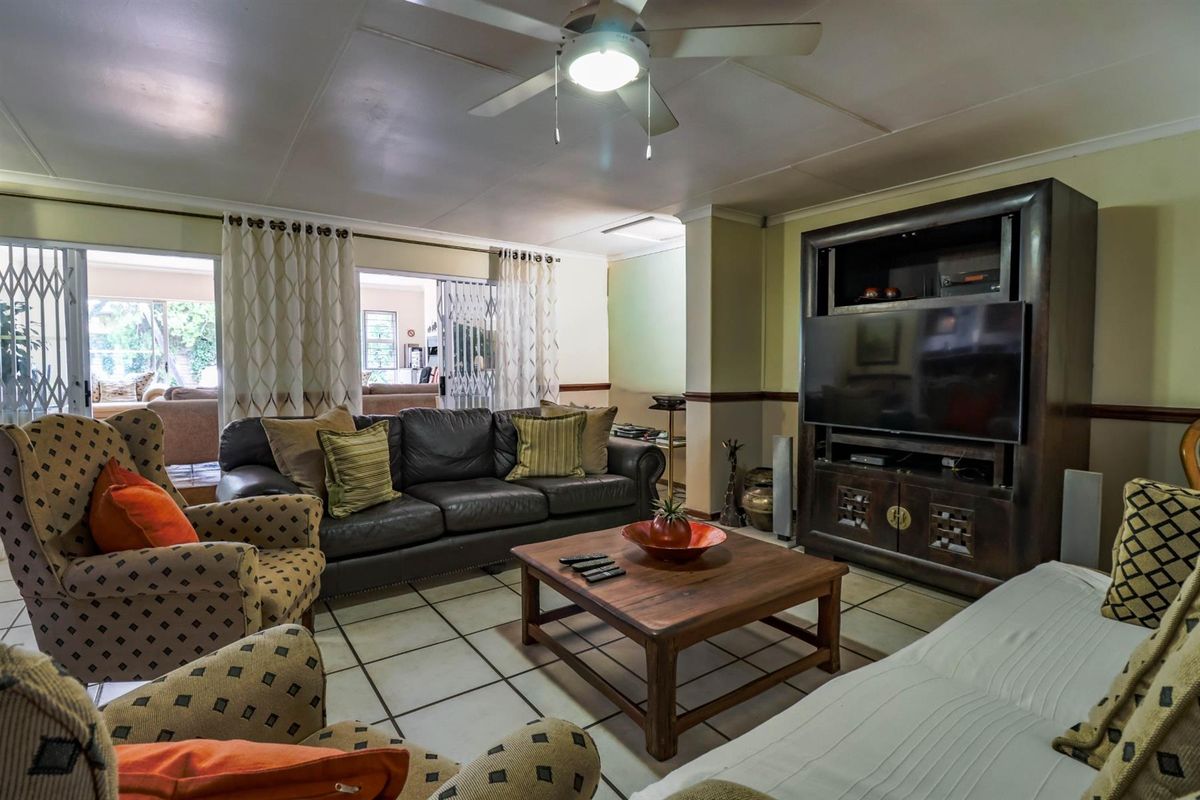 Spacious 4-Bedroom Home with Inverter and Backup Battery - Photo 4