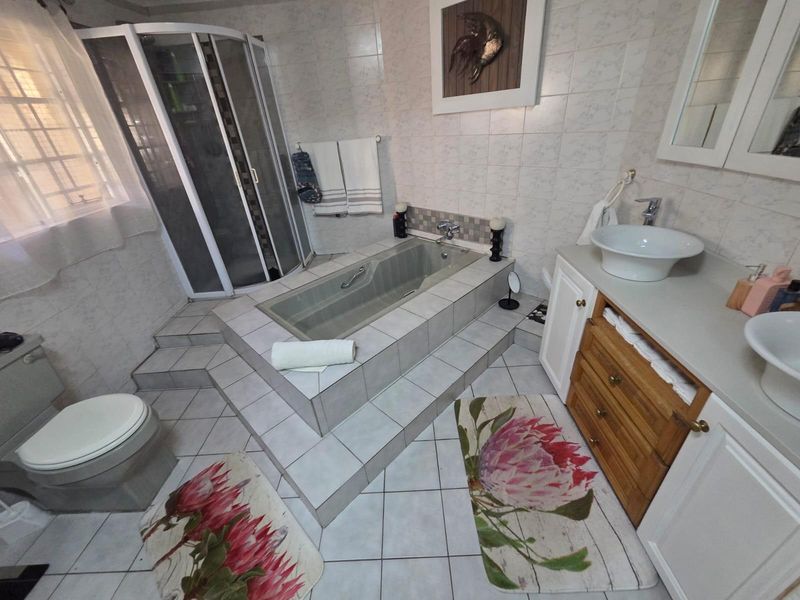 Spacious 4-Bedroom Home with Inverter and Backup Battery - Photo 9