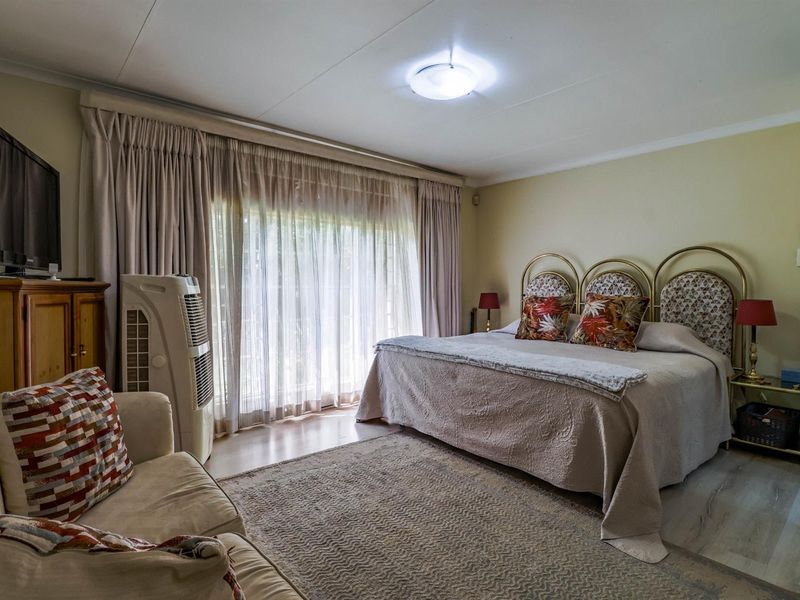 Spacious 4-Bedroom Home with Inverter and Backup Battery - Photo 8