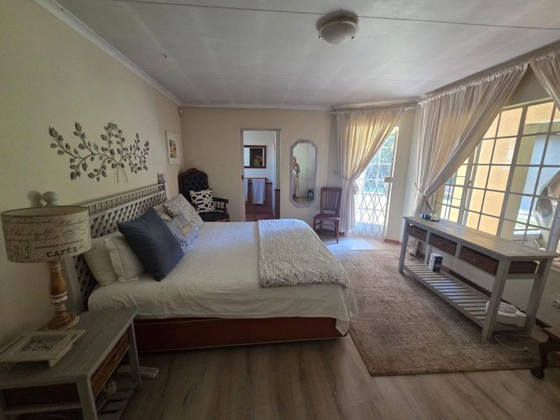 Spacious 4-Bedroom Home with Inverter and Backup Battery - Photo 7