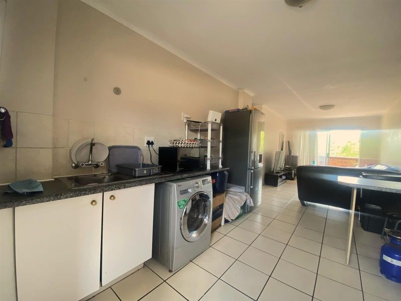 Cozy First Floor Apartment in Security Complex - Photo 3