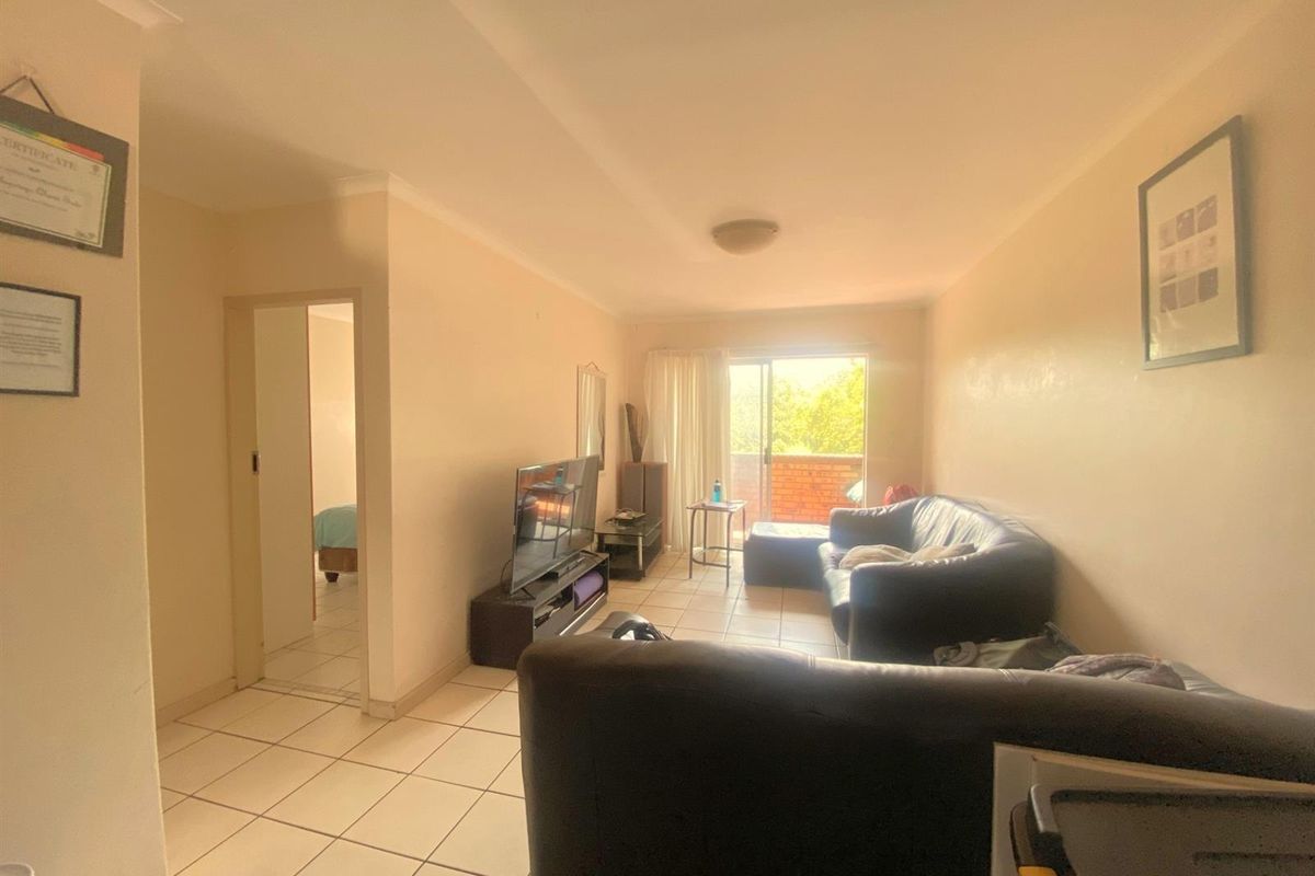 Cozy First Floor Apartment in Security Complex - Photo 5