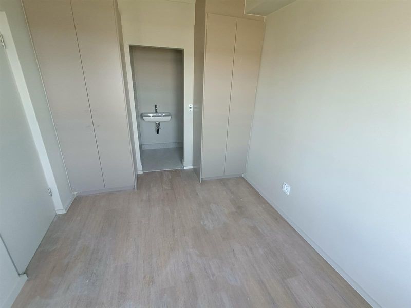 Modern 1-bedroom unit offers a practical, comfortable living space in a well-located and secure - Photo 6