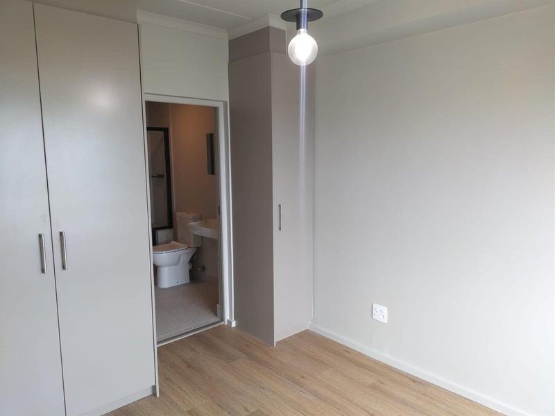 Modern 1-bedroom unit offers a practical, comfortable living space in a well-located and secure - Photo 9