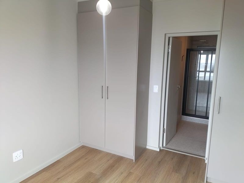 Modern 1-bedroom unit offers a practical, comfortable living space in a well-located and secure - Photo 8