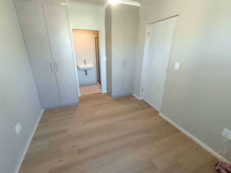 Modern 1-bedroom unit offers a practical, comfortable living space in a well-located and secure - Photo 7