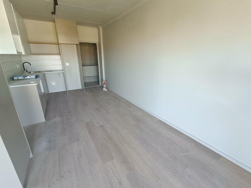 Modern 1-bedroom unit offers a practical, comfortable living space in a well-located and secure - Photo 4