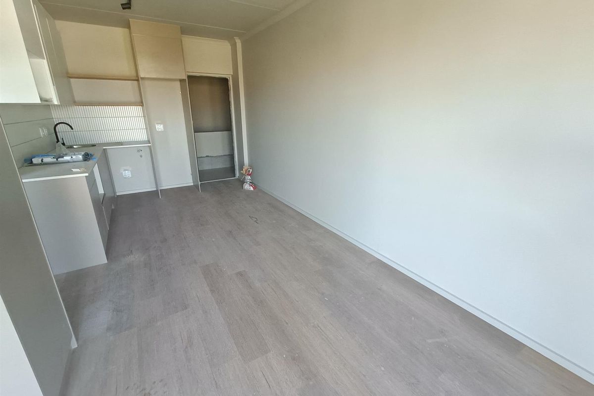 Modern 1-bedroom unit offers a practical, comfortable living space in a well-located and secure - Photo 4