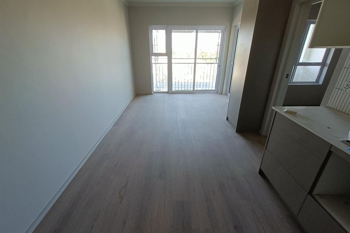 Modern 1-bedroom unit offers a practical, comfortable living space in a well-located and secure - Photo 5