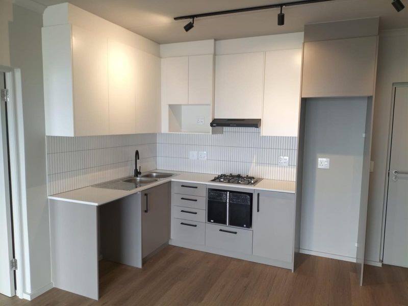 Modern 1-bedroom unit offers a practical, comfortable living space in a well-located and secure - Photo 2