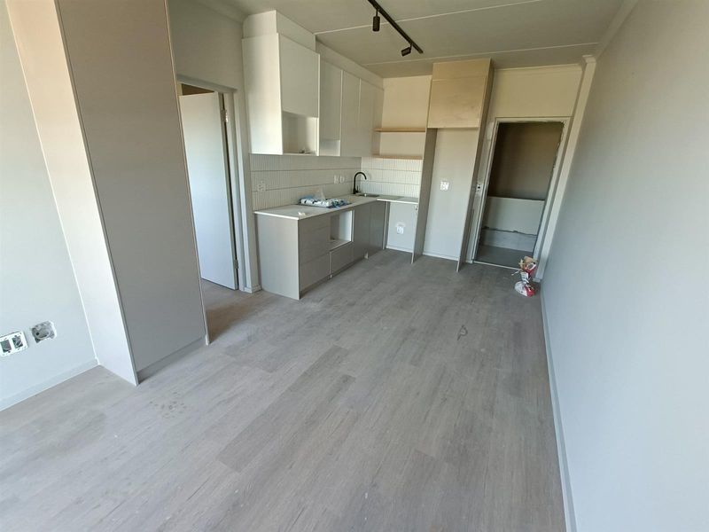 Modern 1-bedroom unit offers a practical, comfortable living space in a well-located and secure - Photo 3