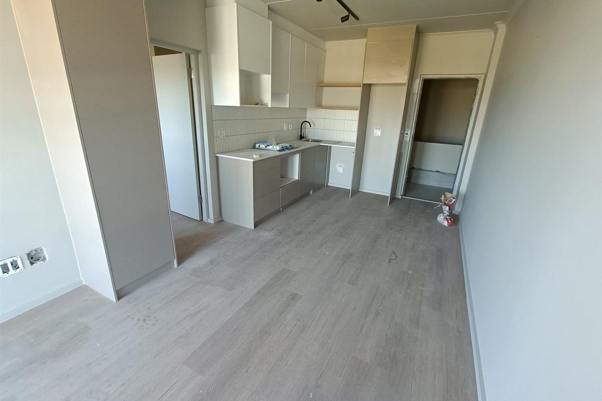 Modern 1-bedroom unit offers a practical, comfortable living space in a well-located and secure - Photo 3