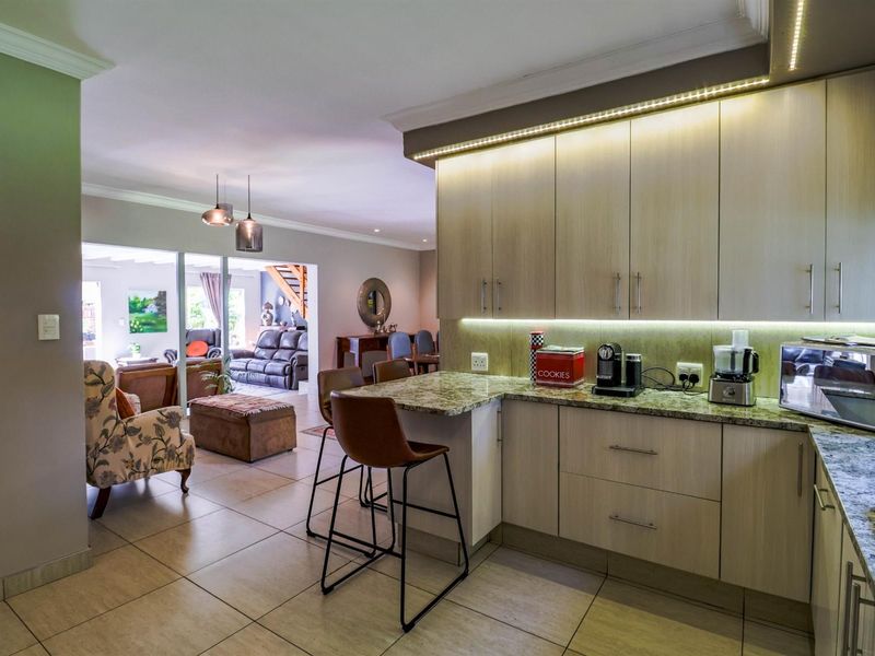 3-Bedroom Family Home with Solar, Borehole and Entertainment Features in The Reeds - Photo 9