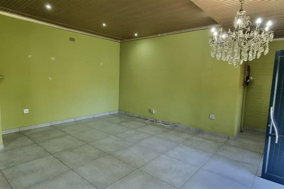 Spacious Family Haven with Income Potential in Sought-After Suburb! - Photo 3