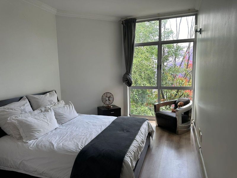 Spacious 1-Bedroom Apartment with Treetop Views in Secure Setting - Photo 8