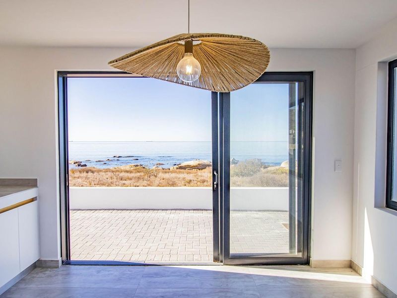 Luxury Beachfront living, Refined by Design and Ocean Vistas! - Photo 3