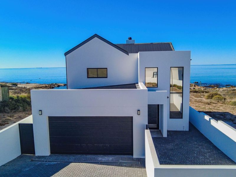 Luxury Beachfront living, Refined by Design and Ocean Vistas! - Photo 2