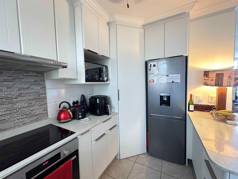 Wake up to ocean views from this modern one bedroom apartment in Glenashley Heights - Photo 9