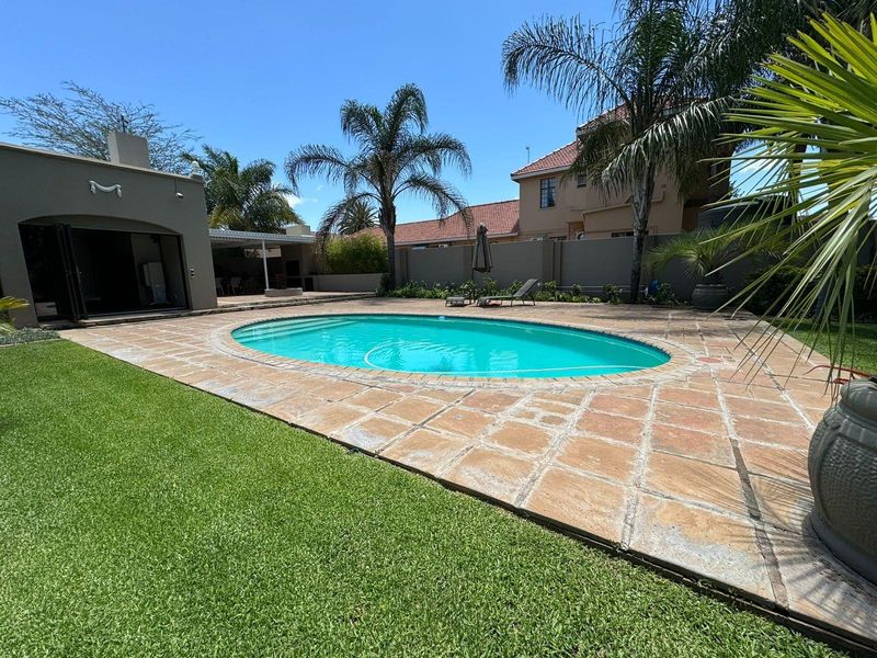 Sophisticated Carrington Road Elegance Meets Family Warmth: Your Forever Home Awaits - Photo 2